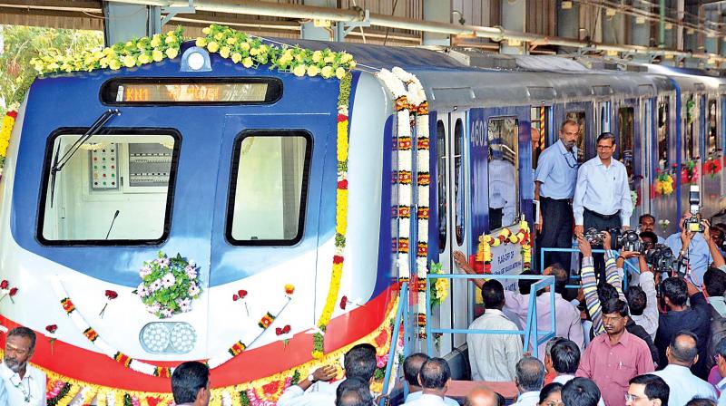 A.K. Mittal, chairman railway board, and S. Mani, general manager of Integral Coach Factory, on Tuesday inspect the new train designed for Kolkata metro. (Photo: DC) A.K. Mittal, chairman railway board, and S. Mani, general manager of Integral Coach Factory, on Tuesday inspect the new train designed for Kolkata metro. (Photo: DC)