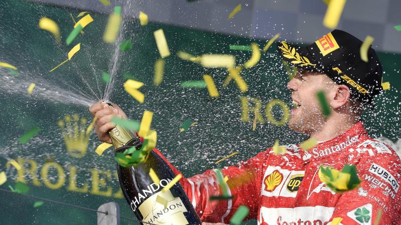 Sebastian Vettel won by almost 10 seconds from Hamilton and Mercedes team-mate Valtteri Bottas in a commanding victory of tactics and speed around the Albert Street circuit. (Photo: AP) Sebastian Vettel won by almost 10 seconds from Hamilton and Mercedes team-mate Valtteri Bottas in a commanding victory of tactics and speed around the Albert Street circuit. (Photo: AP)