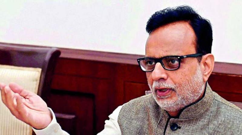 Revenue Secretary Hasmukh Adhia Revenue Secretary Hasmukh Adhia