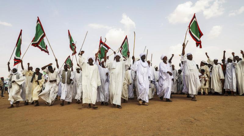 Bashir was ousted by the army on April 11, five days after the protesters had first massed outside army headquarters. Protesters continued their sit-in, demanding that the generals themselves step down, ahead of the brutal dispersal on June 3. (Photo: AFP) Bashir was ousted by the army on April 11, five days after the protesters had first massed outside army headquarters. Protesters continued their sit-in, demanding that the generals themselves step down, ahead of the brutal dispersal on June 3. (Photo: AFP)