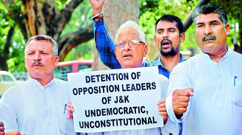 Jammu Kashmir National Panthers Party activists stage a protest against the government demanding the release of all the political leaders detained in the state following the abrogation of special status under Article 370, in Jammu, Thursday. (PTI) Jammu Kashmir National Panthers Party activists stage a protest against the government demanding the release of all the political leaders detained in the state following the abrogation of special status under Article 370, in Jammu, Thursday. (PTI)