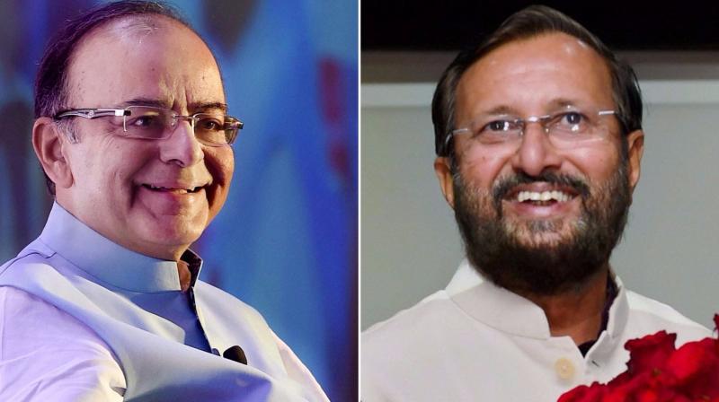 Union ministers Arun Jaitley and Prakash Javadekar were appointed the BJP's election in-charge for the high-stakes Gujarat and Karnataka Assembly polls respectively. (Photos: PTI) Union ministers Arun Jaitley and Prakash Javadekar were appointed the BJP's election in-charge for the high-stakes Gujarat and Karnataka Assembly polls respectively. (Photos: PTI)