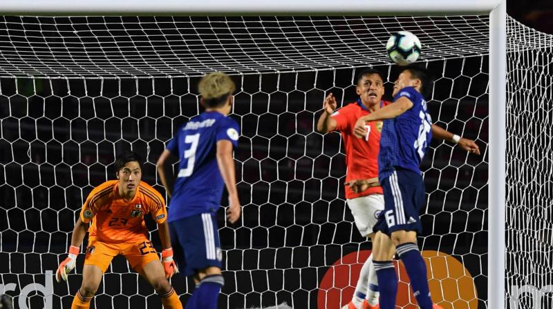 Alexis Sanchez found the net with a header in the 82nd, and Vargas closed the scoring about a minute later with a long lob shot over goalkeeper Keisuke Osako as he charged from his net. (Photo:AFP) Alexis Sanchez found the net with a header in the 82nd, and Vargas closed the scoring about a minute later with a long lob shot over goalkeeper Keisuke Osako as he charged from his net. (Photo:AFP)