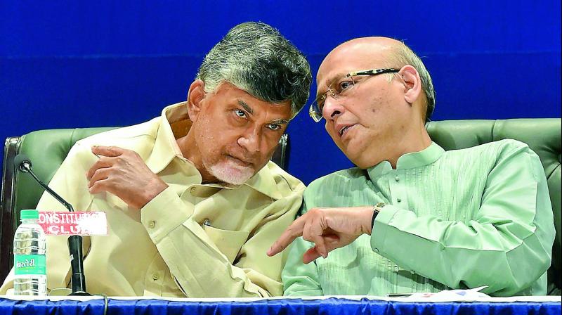 AP Chief Minister N. Chandrababu Naidu with senior Congress leader Abhishek Manu Singhvi at a press conference in New Delhi on Sunday.(Photo: AP) AP Chief Minister N. Chandrababu Naidu with senior Congress leader Abhishek Manu Singhvi at a press conference in New Delhi on Sunday.(Photo: AP)