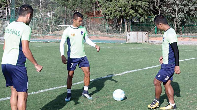Delhi Dynamos players at a training session in Bhubaneswar on Wednesday. Delhi Dynamos players at a training session in Bhubaneswar on Wednesday.