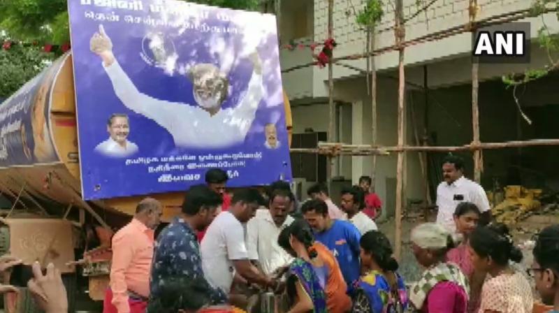 Carrying empty plastic pots in their hands, people waded through the streets to fill with the water. (Photo: ani) Carrying empty plastic pots in their hands, people waded through the streets to fill with the water. (Photo: ani)