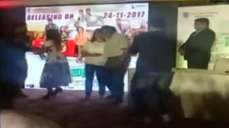 An amateur video that surfaced online showed the Congress MLA and former actor MH Ambarish dancing with a woman at a music launch. (Photo: Screengrab) An amateur video that surfaced online showed the Congress MLA and former actor MH Ambarish dancing with a woman at a music launch. (Photo: Screengrab)