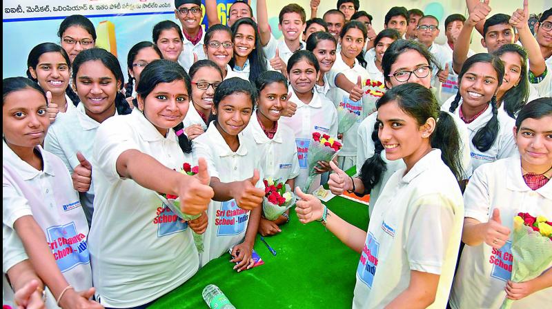 SSC exams toppers of Chaitanya Institute greet each other and pose for a picture at their institute in the city on Wednesday. SSC exams toppers of Chaitanya Institute greet each other and pose for a picture at their institute in the city on Wednesday.