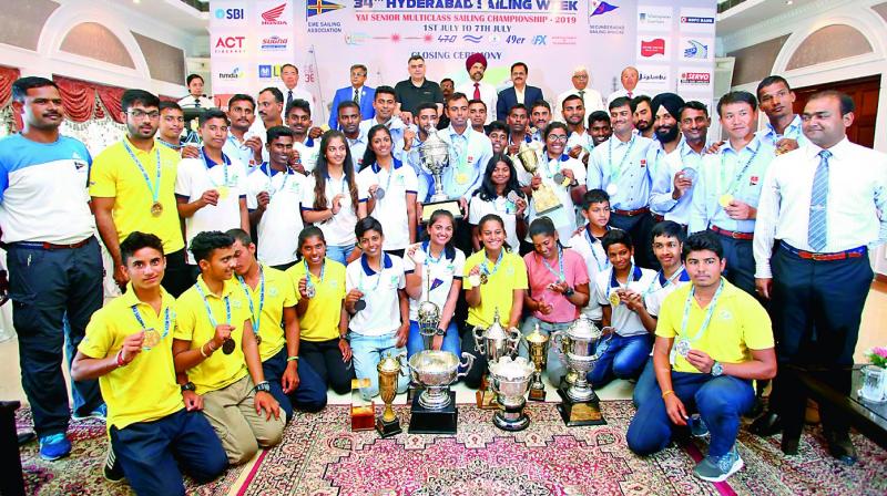 Winners of Senior Multi Class Sailing Championship pose with their medals and trophies at the Sailing Annexe, Secunderabad Sailing Club, on Sunday. Winners of Senior Multi Class Sailing Championship pose with their medals and trophies at the Sailing Annexe, Secunderabad Sailing Club, on Sunday.