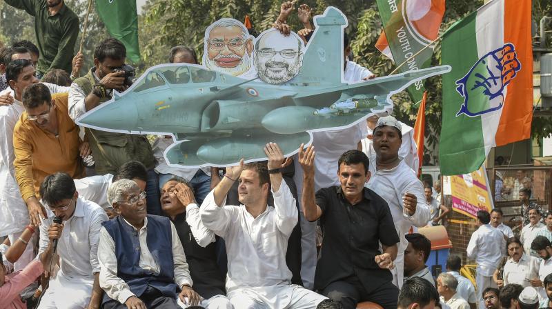 Senior Congress leaders, including Ashok Gehlot, Ahmed Patel, Motilal Vora, Veerappa Moily and Anand Sharma, took part in march that culminated in demonstration ahead of CBI headquarters. (Photo: PTI) Senior Congress leaders, including Ashok Gehlot, Ahmed Patel, Motilal Vora, Veerappa Moily and Anand Sharma, took part in march that culminated in demonstration ahead of CBI headquarters. (Photo: PTI)