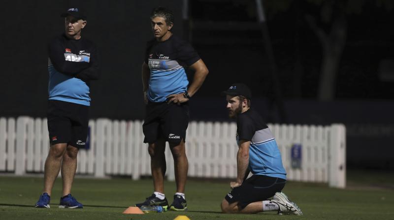 New Zealand captain Kane Williamson (right) and head coach Gary Stead (left) watch players attend a training session ahead of their T20 World Cup final against Australia in Dubai in this file photo. (Photo: AP)