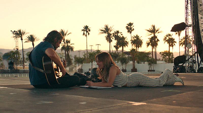 Bradley Cooper and Lady Gaga in the still from A Star Is Born. Bradley Cooper and Lady Gaga in the still from A Star Is Born.