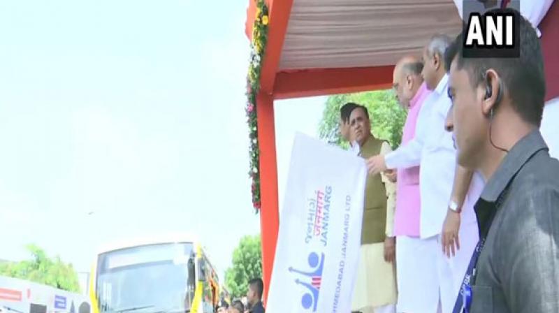 The Home Minister also inaugurated the country's first automated battery charging and swapping station for e-buses here. (Photo: ANI) The Home Minister also inaugurated the country's first automated battery charging and swapping station for e-buses here. (Photo: ANI)