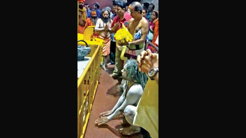 A nude Naga sadhu, accompanied by three semi-clad followers who visited the Lord Venkateswara temple at the Tirumala Tirupati Devasthanams (TTD) Information Centre at T. Nagar in the city created a flutter (Photo: DC) A nude Naga sadhu, accompanied by three semi-clad followers who visited the Lord Venkateswara temple at the Tirumala Tirupati Devasthanams (TTD) Information Centre at T. Nagar in the city created a flutter (Photo: DC)