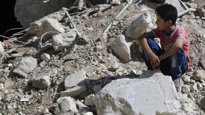 A boy sits amongst rubble in rebel-held eastern Aleppo, Syria. (Photo: AP) A boy sits amongst rubble in rebel-held eastern Aleppo, Syria. (Photo: AP)