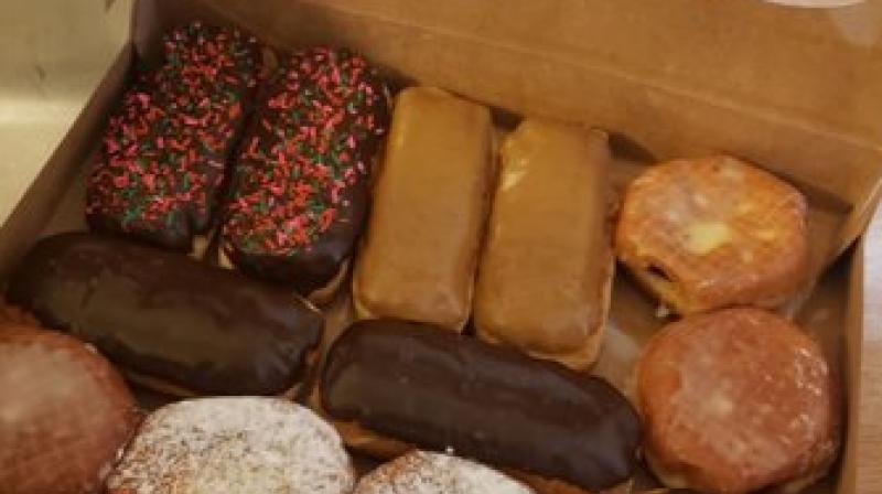 But fearing that the police officers would be angry with him for the break-in, the suspect had brought along a 'peace offering': a fresh box of donuts. (Photo: King County Sheriff’s Office) But fearing that the police officers would be angry with him for the break-in, the suspect had brought along a 'peace offering': a fresh box of donuts. (Photo: King County Sheriff’s Office)