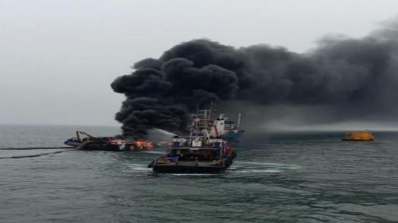The offshore Coastal Jaguar caught fire at around 11 am. (Photo: ANI) The offshore Coastal Jaguar caught fire at around 11 am. (Photo: ANI)