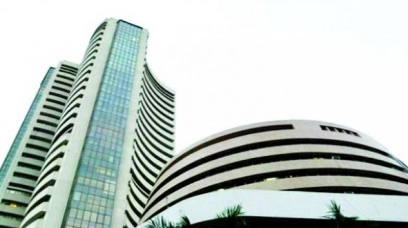 Street cheers exit poll results; Sensex climbs 300 points, Nifty above 10350 Street cheers exit poll results; Sensex climbs 300 points, Nifty above 10350