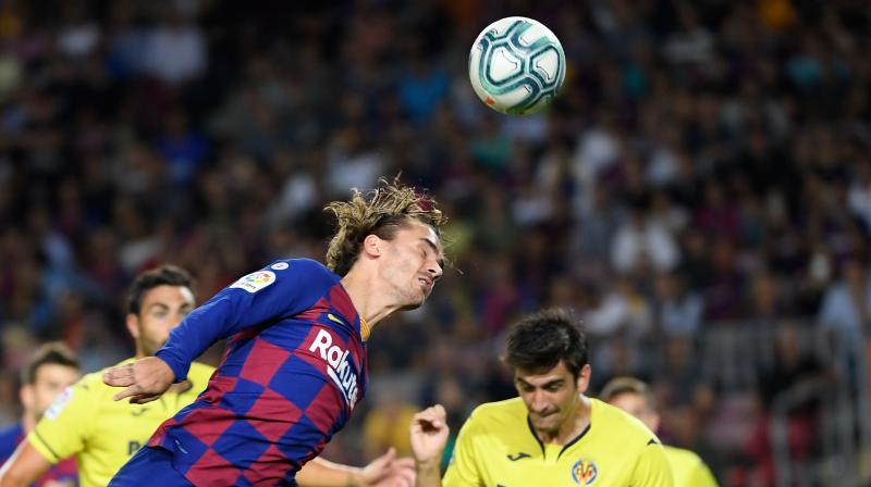 Antoine Griezmann headed Barcelona in front after six minutes, darting in at the near post to meet a Lionel Messi corner. (Photo:AFP) Antoine Griezmann headed Barcelona in front after six minutes, darting in at the near post to meet a Lionel Messi corner. (Photo:AFP)