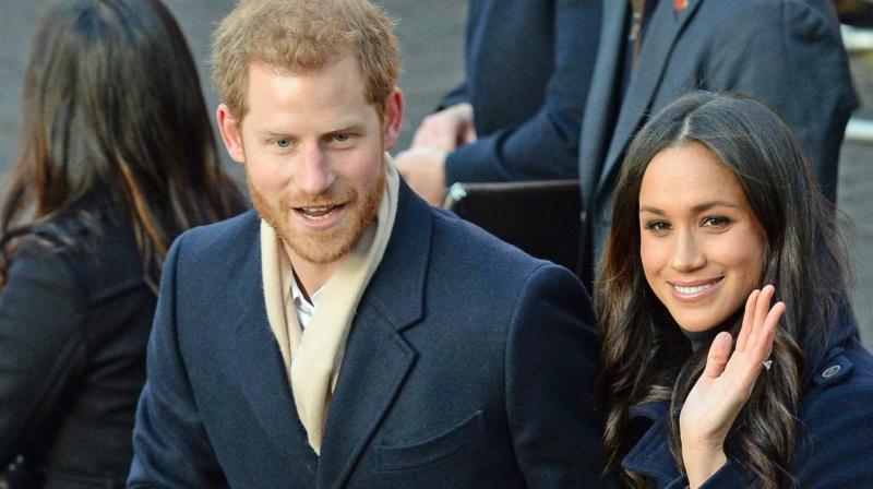 She then rushed back to Prince Harry's side, as they continued greeting the crowds. (Photo: AP) She then rushed back to Prince Harry's side, as they continued greeting the crowds. (Photo: AP)
