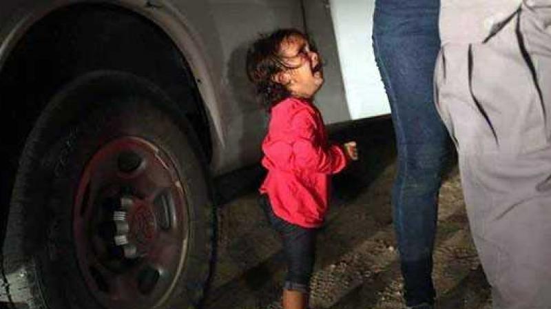 The picture of the wailing toddler was published worldwide and caused a public outcry about Washington's controversial policy to separate thousands of migrants and their children. (Photo: Facebook) The picture of the wailing toddler was published worldwide and caused a public outcry about Washington's controversial policy to separate thousands of migrants and their children. (Photo: Facebook)