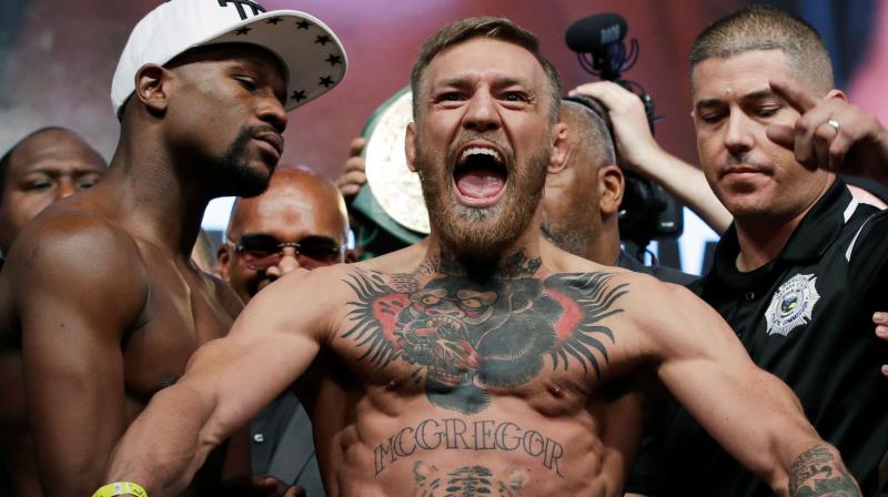 Video of the incident clearly showed Conor McGregor hurling a dolly through a side window of the bus as it moved slowly in a car park at the Barclays Center in New York. (Photo: AP) Video of the incident clearly showed Conor McGregor hurling a dolly through a side window of the bus as it moved slowly in a car park at the Barclays Center in New York. (Photo: AP)
