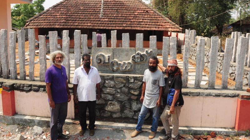(From left) John Mathew, V.K. Rajan, Hochimin, Joseph M. Varghese, the artists who recreated Khasak, before the Njattupura (From left) John Mathew, V.K. Rajan, Hochimin, Joseph M. Varghese, the artists who recreated Khasak, before the Njattupura