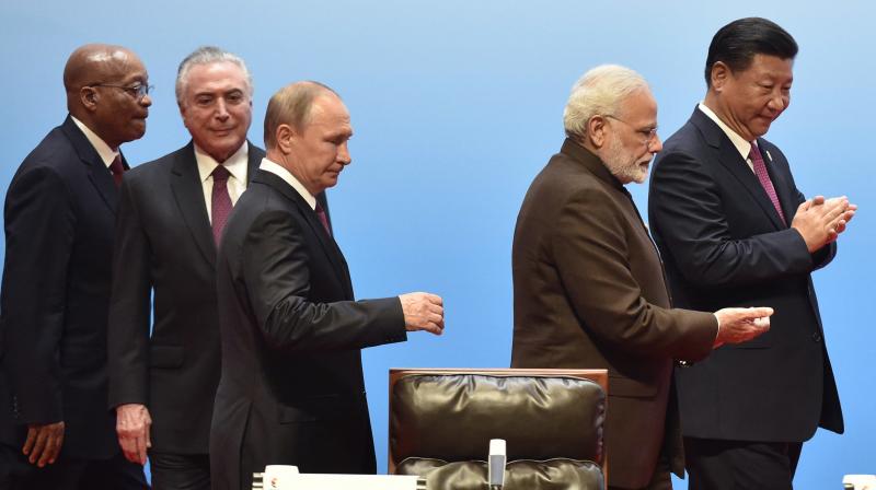 BRICS leaders from left to right, South Africa's President Jacob Zuma, Brazilian President Michel Temer, Russian President Vladimir Putin, Indian Prime Minister Narendra Modi, and Chinese President Xi Jinping attend BRICS Business Council and Signing ceremony, at the BRICS Summit in Xiamen. (Photo: AP) BRICS leaders from left to right, South Africa's President Jacob Zuma, Brazilian President Michel Temer, Russian President Vladimir Putin, Indian Prime Minister Narendra Modi, and Chinese President Xi Jinping attend BRICS Business Council and Signing ceremony, at the BRICS Summit in Xiamen. (Photo: AP)