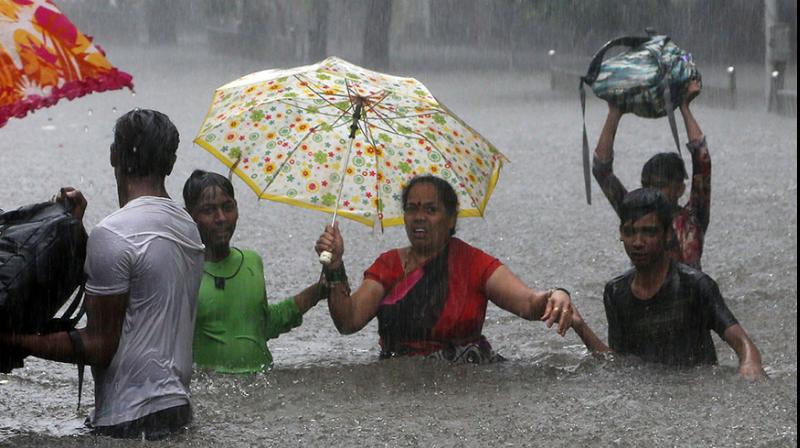 Mumbai has received 3,669.6 mm rainfall so far this season - the highest in 61 years - as against its normal quota of 2,350 mm. (Photo: AP) Mumbai has received 3,669.6 mm rainfall so far this season - the highest in 61 years - as against its normal quota of 2,350 mm. (Photo: AP)