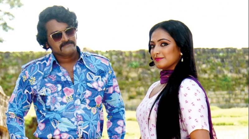 Take a ride back, to one such time in this suspense thriller wherein men wore trousers with bell bottom shapes, long collars and flaunted sideburns with hairdos which looks like waves. Take a ride back, to one such time in this suspense thriller wherein men wore trousers with bell bottom shapes, long collars and flaunted sideburns with hairdos which looks like waves.