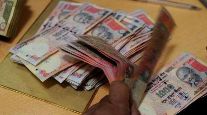 standard gold was being sold for Rs 4,100 per gram as against the market rate of Rs 2,950, for those offering banned currency. (Representational image) standard gold was being sold for Rs 4,100 per gram as against the market rate of Rs 2,950, for those offering banned currency. (Representational image)