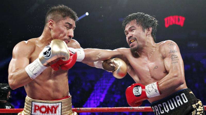 Pacquiao won on all three ringside scorecards – 118-109, 118-109 114-113 – to take the piece of the title Vargas won in his last fight. (Photo: AP) Pacquiao won on all three ringside scorecards – 118-109, 118-109 114-113 – to take the piece of the title Vargas won in his last fight. (Photo: AP)