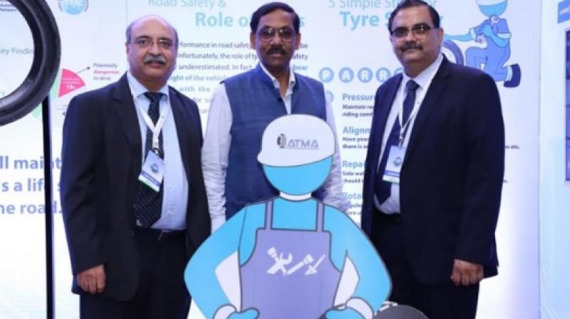 Mr. Anil Srivastava at Tyre Safety Pledge pavilion with Mr Ashish Pandey and ATMA DG Mr. Rajiv Budhraja Mr. Anil Srivastava at Tyre Safety Pledge pavilion with Mr Ashish Pandey and ATMA DG Mr. Rajiv Budhraja