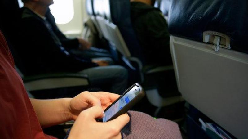 The license for IFMC services by DoT will now make it possible for people to access high quality broadband internet services and make voice calls while flying. (Representational Image) The license for IFMC services by DoT will now make it possible for people to access high quality broadband internet services and make voice calls while flying. (Representational Image)