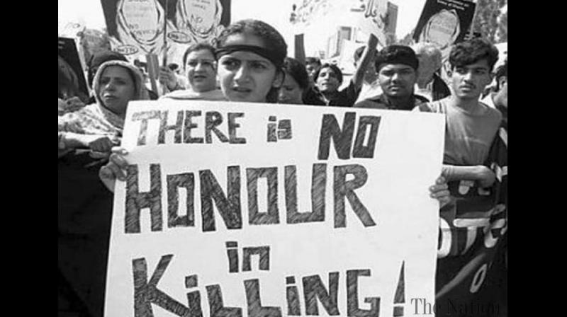 More than 500 people -- almost all women -- die in Pakistan each year in such killings (File Photo) More than 500 people -- almost all women -- die in Pakistan each year in such killings (File Photo)