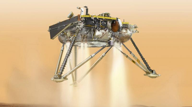 This illustration made available by NASA in October 2016 shows an illustration of NASA's InSight lander about to land on the surface of Mars. (NASA/JPL-Caltech via AP) This illustration made available by NASA in October 2016 shows an illustration of NASA's InSight lander about to land on the surface of Mars. (NASA/JPL-Caltech via AP)