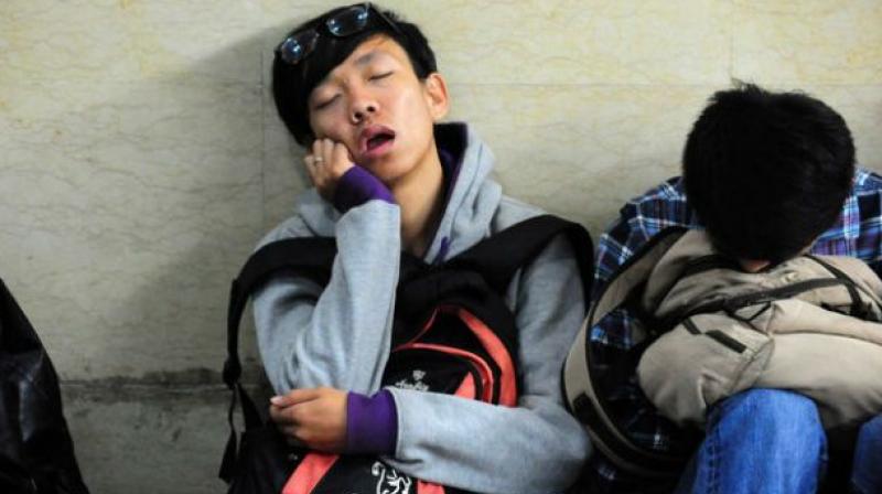 People were less willing to socialise with tired-looking subjects (Photo: AFP) People were less willing to socialise with tired-looking subjects (Photo: AFP)