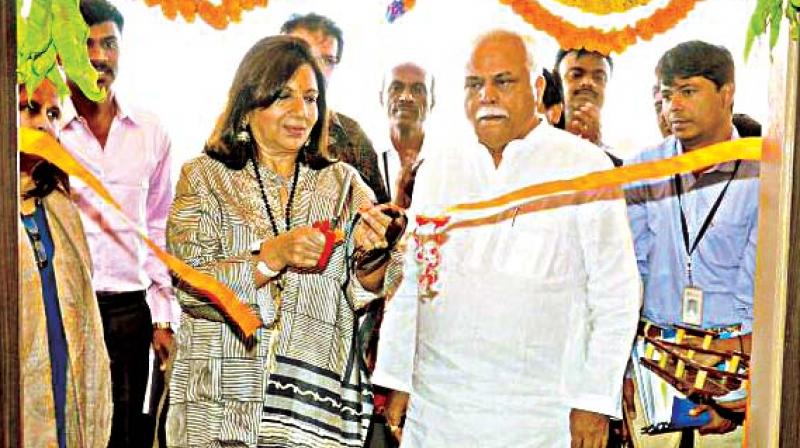 Industries Minister R.V. Deshpande and Kiran Mazumdar-Shaw, Founder, Biocon Foundation, inaugurate a hostel for women at Haliyal in Uttara Kannada on Monday Industries Minister R.V. Deshpande and Kiran Mazumdar-Shaw, Founder, Biocon Foundation, inaugurate a hostel for women at Haliyal in Uttara Kannada on Monday