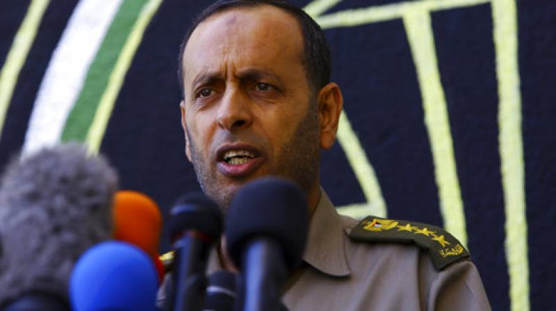 Nasser Suliman, head of Hamas' military judiciary, announces during a press conference that the military court sentenced to death three men convicted of killing Mazen Faqha, a top militant commander in March, at Hamas military judiciary building in Gaza City. (Photo: AP) Nasser Suliman, head of Hamas' military judiciary, announces during a press conference that the military court sentenced to death three men convicted of killing Mazen Faqha, a top militant commander in March, at Hamas military judiciary building in Gaza City. (Photo: AP)