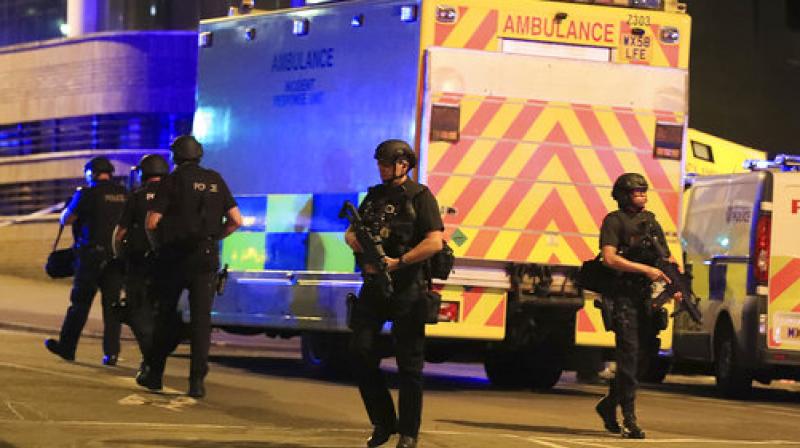 Armed police work at Manchester Arena after reports of an explosion at the venue during an Ariana Grande gig in Manchester, England. (Photo: AP) Armed police work at Manchester Arena after reports of an explosion at the venue during an Ariana Grande gig in Manchester, England. (Photo: AP)