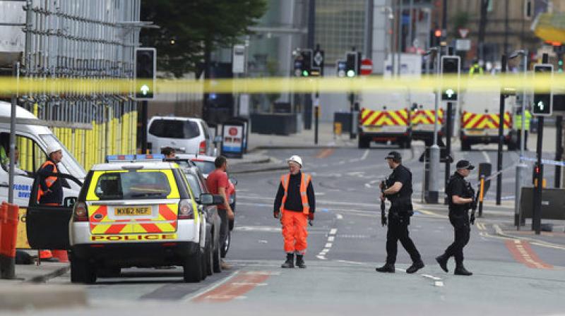 Police guard close to the Manchester Arena in Manchester, Britain, Tuesday, a day after an explosion. (Photo: AP) Police guard close to the Manchester Arena in Manchester, Britain, Tuesday, a day after an explosion. (Photo: AP)