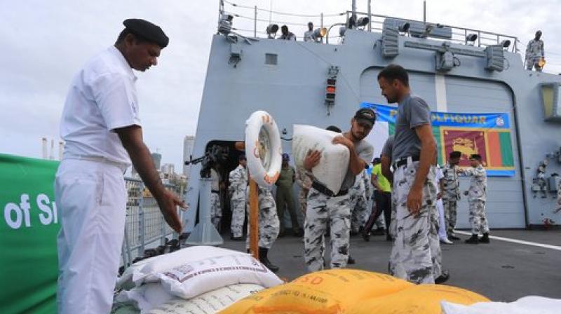Pakistan Navy soldiers of PNS Zulfiquar unload relief materials to be used in the flood affected areas, Colombo, Sri Lanka, Tuesday, May 30, 2017. Mudslides have become common during Sri Lanka's summer monsoon season as forests across the tropical Indian Ocean island nation have been cleared for export crops such as tea and rubber. (Photo: AP) Pakistan Navy soldiers of PNS Zulfiquar unload relief materials to be used in the flood affected areas, Colombo, Sri Lanka, Tuesday, May 30, 2017. Mudslides have become common during Sri Lanka's summer monsoon season as forests across the tropical Indian Ocean island nation have been cleared for export crops such as tea and rubber. (Photo: AP)