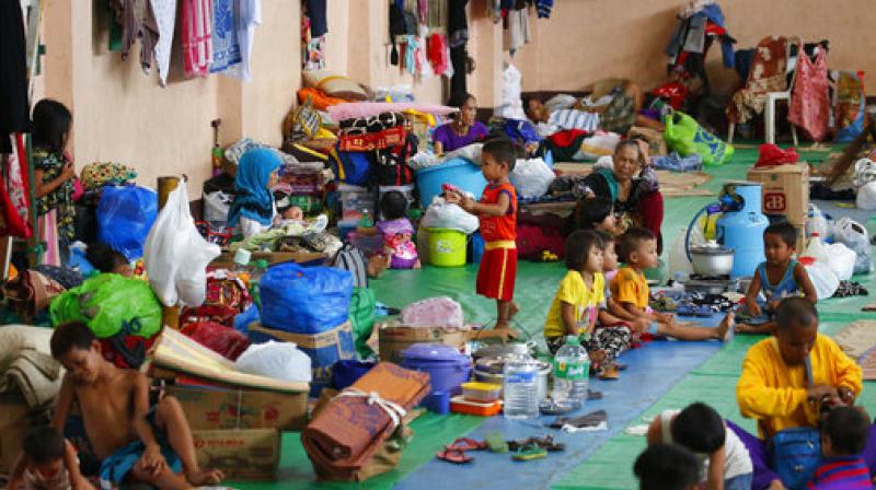 Displaced residents of Marawi city rest in an evacuation center in Balo-i township, Lanao del Norte province in southern Philippines. Tens of thousands of residents are now housed in different evacuation centers as government troops continue to fight Muslim militants in Marawi city. (Photo: AP) Displaced residents of Marawi city rest in an evacuation center in Balo-i township, Lanao del Norte province in southern Philippines. Tens of thousands of residents are now housed in different evacuation centers as government troops continue to fight Muslim militants in Marawi city. (Photo: AP)