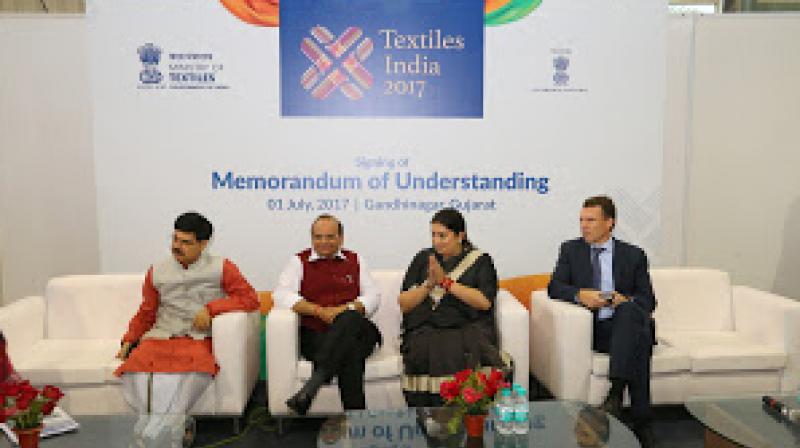 Union Minister Smriti Irani at the Textile India 2017 event with other eminent personalities. Credit: PIB. Union Minister Smriti Irani at the Textile India 2017 event with other eminent personalities. Credit: PIB.