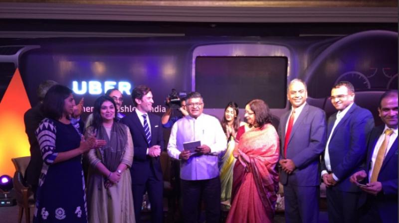 Union Minister Ravi Shankar Prasad books his Uber with UPI. Photo: Twitter| @Uber_India Union Minister Ravi Shankar Prasad books his Uber with UPI. Photo: Twitter| @Uber_India