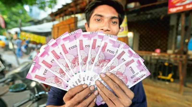 The Reserve Bank of India (RBI) refused to share details of a decision to put the logo of Prime Minister Narendra Modi's 'Swachh Bharat Abhiyan' on the new Rs 500 and Rs 2,000 notes. Photo: AP The Reserve Bank of India (RBI) refused to share details of a decision to put the logo of Prime Minister Narendra Modi's 'Swachh Bharat Abhiyan' on the new Rs 500 and Rs 2,000 notes. Photo: AP