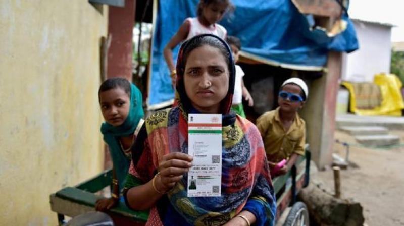Only about 2,300 branches of private and public sector banks have opened Aadhaar enrolment and updation centres within their premises, said an official source on Friday. (Photo: PTI) Only about 2,300 branches of private and public sector banks have opened Aadhaar enrolment and updation centres within their premises, said an official source on Friday. (Photo: PTI)