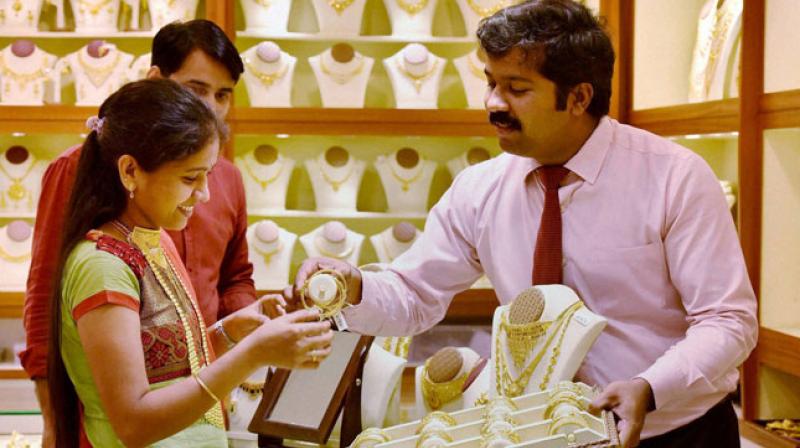 Wedding season in the coming weeks is expected to up the demand for gold. (Photo: PTI) Wedding season in the coming weeks is expected to up the demand for gold. (Photo: PTI)