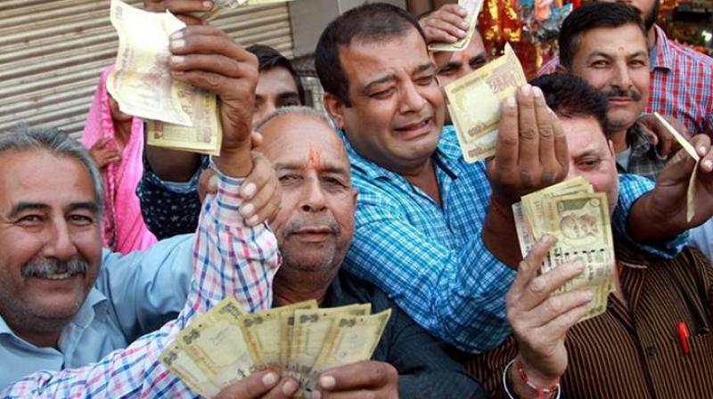 Demonetisation has helped flush out black money, eliminate fake notes and reduce the currency in circulation, said the finance ministry. (Photo: PTI) Demonetisation has helped flush out black money, eliminate fake notes and reduce the currency in circulation, said the finance ministry. (Photo: PTI)