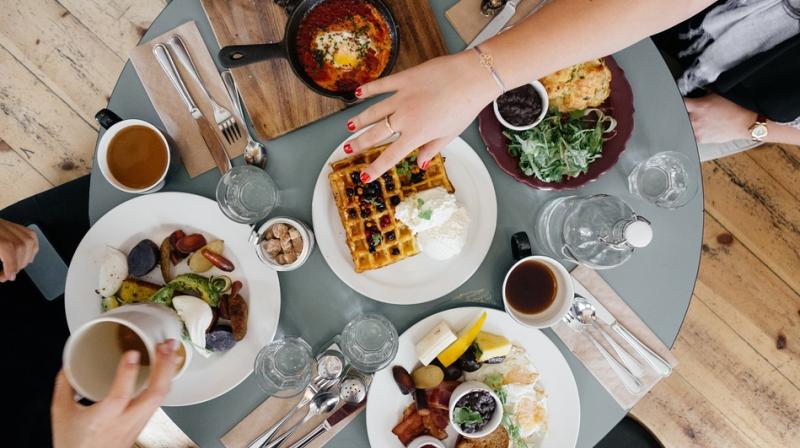 Eating out will get cheaper from Wednesday as the GST Council has slashed rates on food served in AC and non AC restaurants to 5 per cent. (Photo: Pixabay) Eating out will get cheaper from Wednesday as the GST Council has slashed rates on food served in AC and non AC restaurants to 5 per cent. (Photo: Pixabay)